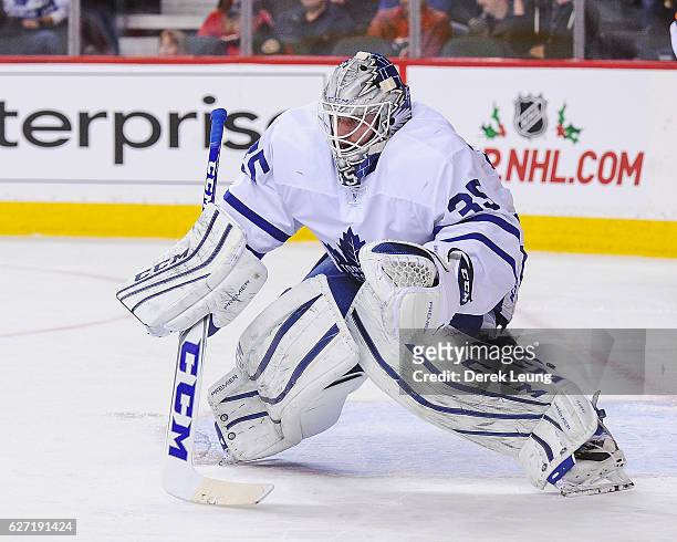 Jhonas Enroth of the Toronto Maple Leafs in action against the Calgary Flames during an NHL game at Scotiabank Saddledome on November 30, 2016 in...