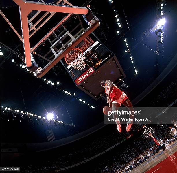 Slam Dunk Contest: Atlanta Hawks Dominique Wilkins in action, dunking at Miami Arena. Miami, FL 2/10/1990 CREDIT: Walter Iooss Jr.