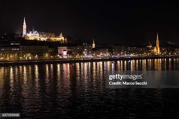 The lit Casle district of Buda is seen from one of the bridges on the Danube on December 2, 2016 in Budapest, Hungary. The traditional Christmas...