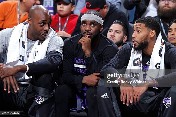 Anthony Tolliver, Ty Lawson and Garrett Temple of the Sacramento Kings look on during the game against the Oklahoma City Thunder on November 23, 2016...