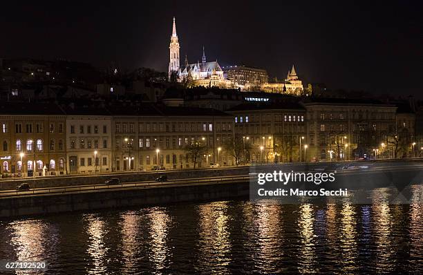 The lit Casle district of Buda is seen from one of the bridges on the Danube on December 2, 2016 in Budapest, Hungary. The traditional Christmas...