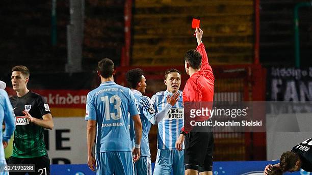 Alexander Bittroff of Chemnitz get the Red Card from Referee Patrick Schult during the Third League match between Preussen Muenster and Chemnitzer FC...