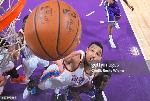 Andre Roberson of the Oklahoma City Thunder rebounds against Darren Collison of the Sacramento Kings on November 23, 2016 at Golden 1 Center in...