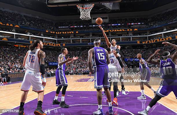 Andre Roberson of the Oklahoma City Thunder rebounds against the Sacramento Kings on November 23, 2016 at Golden 1 Center in Sacramento, California....