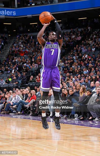 Darren Collison of the Sacramento Kings shoots a three pointer against the Oklahoma City Thunder on November 23, 2016 at Golden 1 Center in...