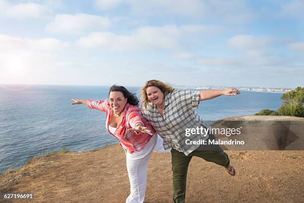 two woman having fun - fat lesbian stock pictures, royalty-free photos & images