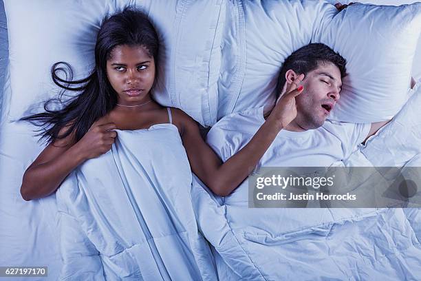 snoring husband - snoring husband stock pictures, royalty-free photos & images