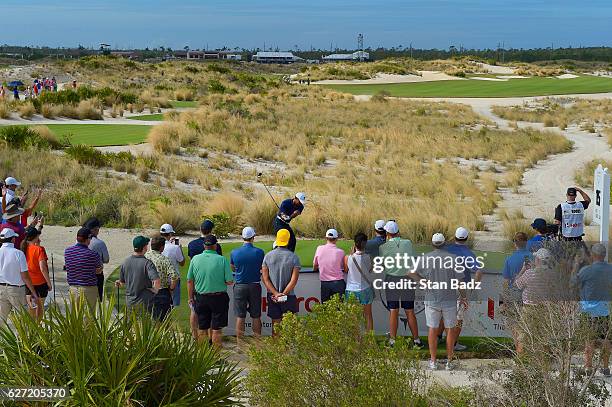 Tiger Woods hits a tee shot on the 15th hole during the second round of the Hero World Challenge at Albany course on December 2, 2016 in Nassau,...