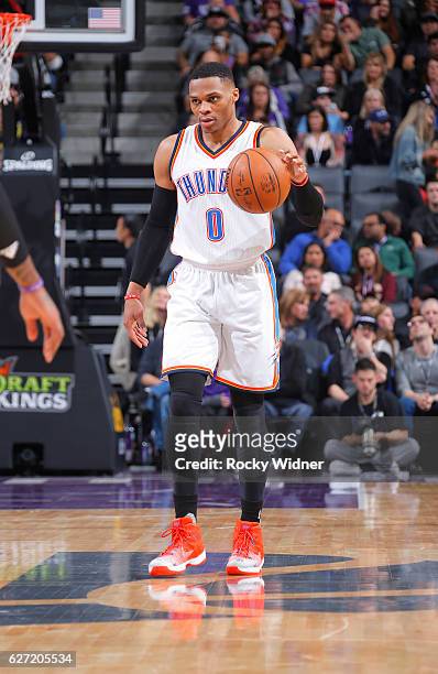 Russell Westbrook of the Oklahoma City Thunder brings the ball up the court against the Sacramento Kings on November 23, 2016 at Golden 1 Center in...