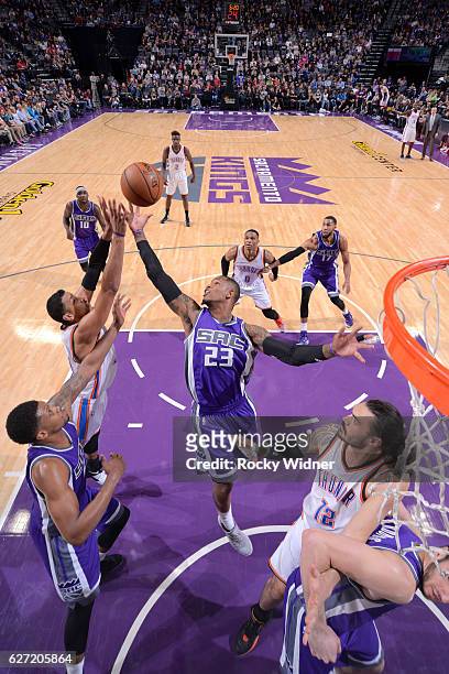 Ben McLemore of the Sacramento Kings rebounds against Andre Roberson of the Oklahoma City Thunder on November 23, 2016 at Golden 1 Center in...