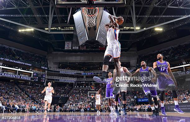 Jerami Grant of the Oklahoma City Thunder dunks against the Sacramento Kings on November 23, 2016 at Golden 1 Center in Sacramento, California. NOTE...