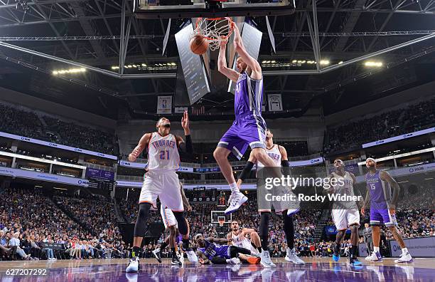 Kosta Koufos of the Sacramento Kings dunks against the Oklahoma City Thunder on November 23, 2016 at Golden 1 Center in Sacramento, California. NOTE...