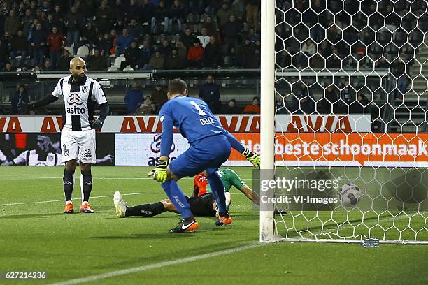 Samuel Armenteros of Heracles Almelo scores, Joris Delle of NEC Nijmegen, Wojciech Golla of NEC Nijmegenduring the Dutch Eredivisie match between...