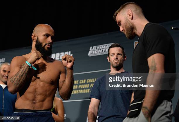 Flyweight champion Demetrious Johnson and Tim Elliott face off during the TUF Finale weigh-in in the Palms Resort & Casino on December 2, 2016 in Las...