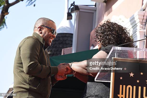 Lee Daniels and Gabourey Sidibe attend the ceremony honoring Lee Daniels with a Star on the Hollywood Walk of Fame on December 2, 2016 in Hollywood,...
