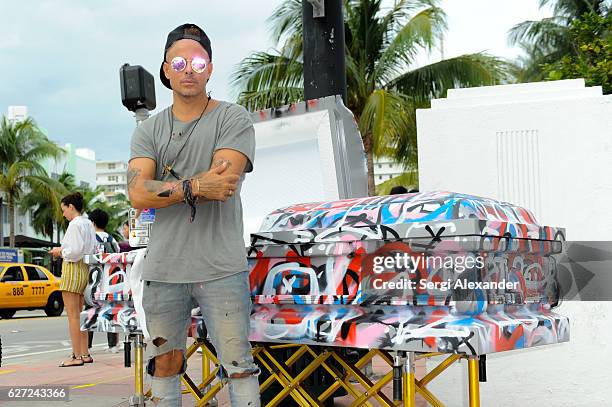 Artist Louis Carreon unveils his urban installation "Street Art Is Dead" on December 2, 2016 in Miami Beach, Florida.