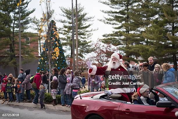 santa at christmas parade in johnson city, tennessee - car parade stock pictures, royalty-free photos & images