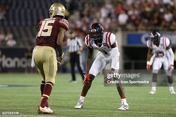 Mississippi Rebels defensive back Tony Bridges gets set to cover Florida State Seminoles wide receiver Travis Rudolph during the NCAA football game...
