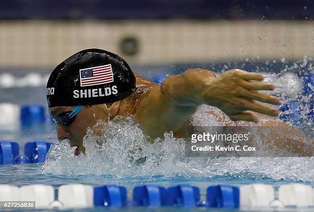 Tom Shields competes in the Men's 100 Yard Butterfly Finals during day three of the 2016 AT&T Winter National Championships at McAuley Aquatic Center...