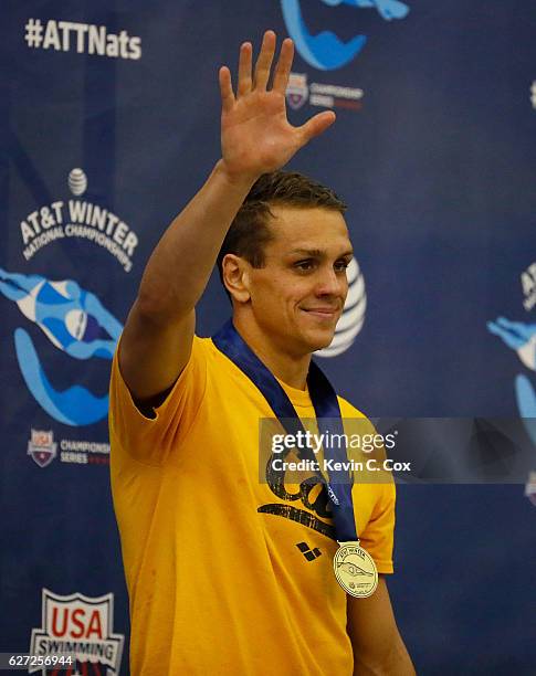 Tom Shields reacts after winning the Men's 100 Yard Butterfly Finals during day three of the 2016 AT&T Winter National Championships at McAuley...