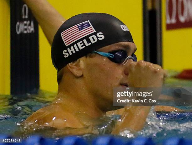 Tom Shields reacts after winning the Men's 100 Yard Butterfly Finals during day three of the 2016 AT&T Winter National Championships at McAuley...