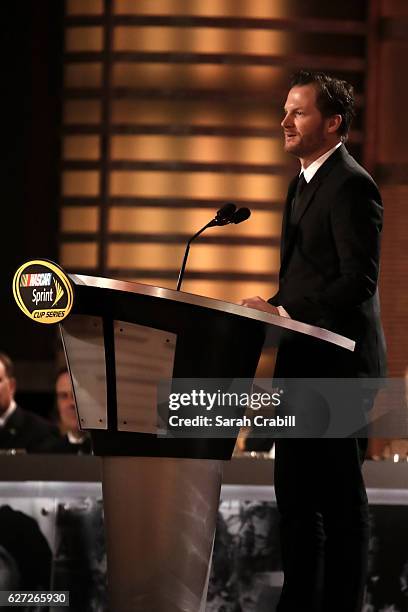 Driver Dale Earnhardt Jr. Speaks on stage after receiving the NMPA Sprint most popular driver award during the 2016 NASCAR Sprint Cup Series Awards...