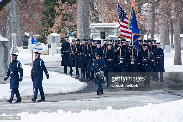 honor guard marches during militery funeral at arlington national cemetery - caisson stock pictures, royalty-free photos & images