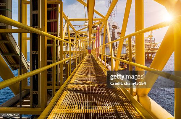 oil and gas industrial platform walk way. - construction crane asia stock pictures, royalty-free photos & images