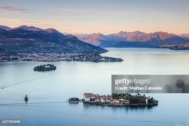 sunset over borromean islands, lake maggiore, italy - isola bella stock pictures, royalty-free photos & images