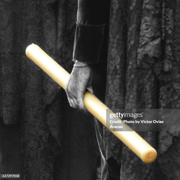 woman wearing a traditional black dress and holding a candle during an easter procession in granada, andalusia, spain - black glove stock pictures, royalty-free photos & images