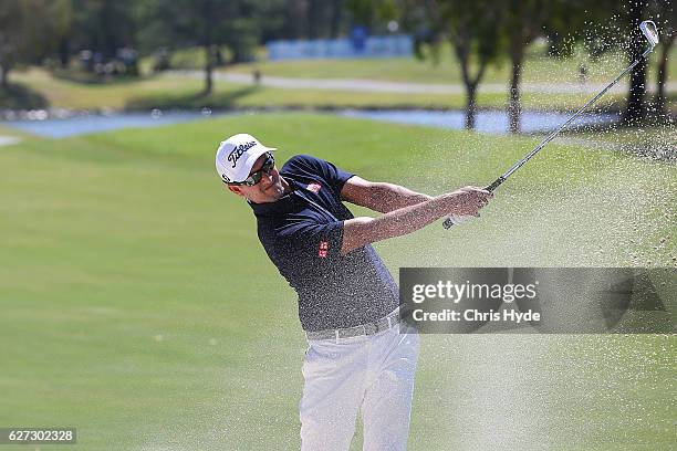 Adam Scott of Australia plays his second shot during day three of the Australian PGA Championships at RACV Royal Pines Resort on December 3, 2016 in...