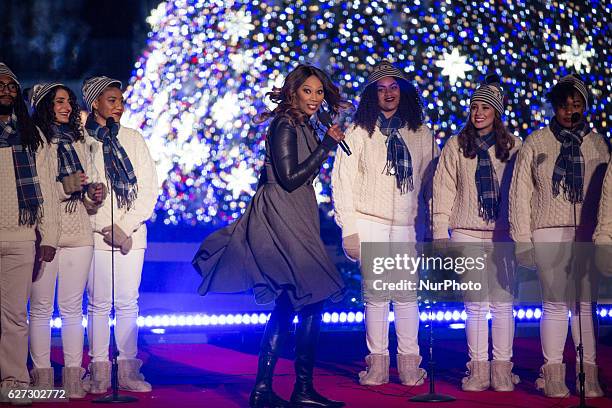 Gospel artist Yolanda Adams, accompanied by Howard University Afro Blue Vocal Jazz Ensemble, performs at the 94th Annual National Christmas Tree...