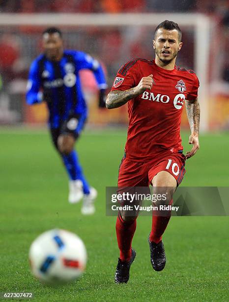 Sebastian Giovinco of Toronto FC chases the ball during the first half of the MLS Eastern Conference Final, Leg 2 game against Montreal Impact at BMO...