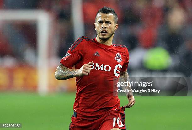 Sebastian Giovinco of Toronto FC chases the ball during the first half of the MLS Eastern Conference Final, Leg 2 game against Montreal Impact at BMO...