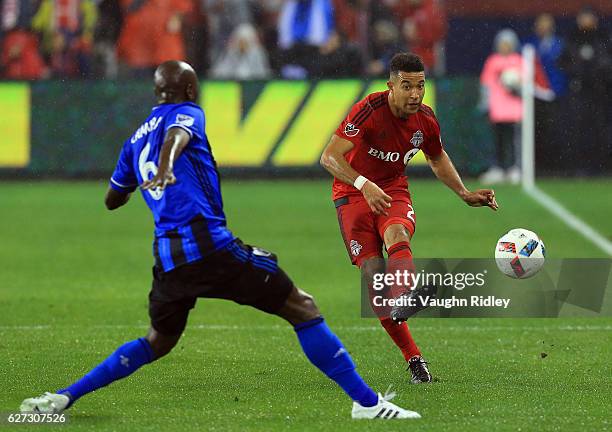 Justin Morrow of Toronto FC passes the ball during the first half of the MLS Eastern Conference Final, Leg 2 game against Montreal Impact at BMO...