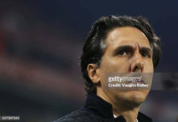 Manager Mauro Biello of Montreal Impact looks on prior to the first half of the MLS Eastern Conference Final, Leg 2 game against Toronto FC at BMO...