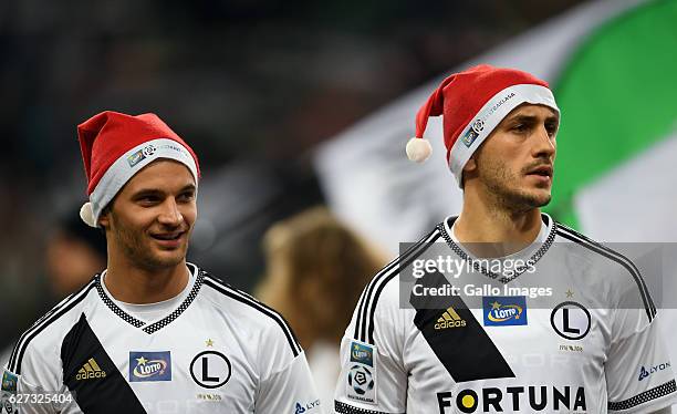 Bartosz Bereszynski of Legia Warszawa and Tomasz Jodlowiec of Legia Warszawa wth santa hat during the LOTTO Extraklasa match between Legia Warszawa...