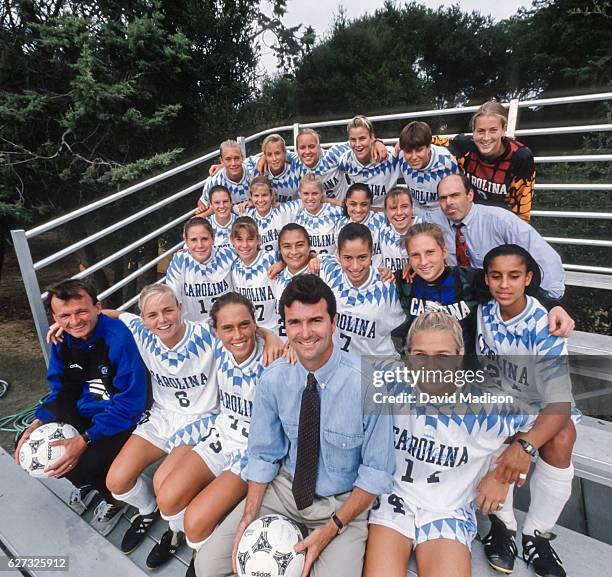 Coach Anson Dorrance poses with the University of North Carolina Tar Heels women's soccer team while training on September 24, 1994 at Saint Mary's...