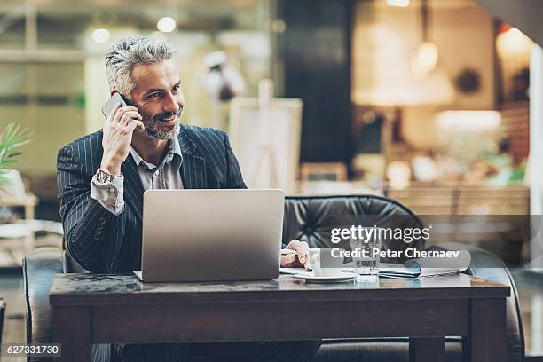 successful middle age businessman - sales executive stock pictures, royalty-free photos & images