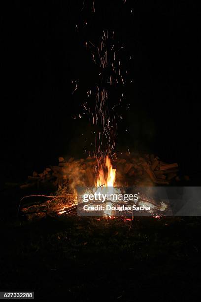 large bonfire in the outdoors - bonfire stock pictures, royalty-free photos & images