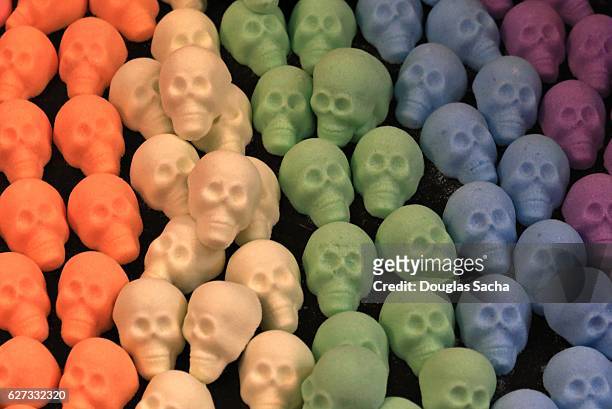 colorful skull shaped candy - sugar skull stockfoto's en -beelden