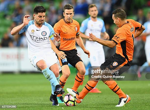 Bruno Fornaroli of the City collides with Jade North of Brisbane Roar as they compete for the ball during the round nine A-League match between...