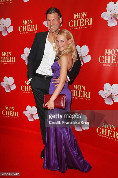 Designer Sonja Kiefer and her boyfriend Cedric Schwarz attend the Mon Cheri Barbara Tag at Postpalast on December 2, 2016 in Munich, Germany.