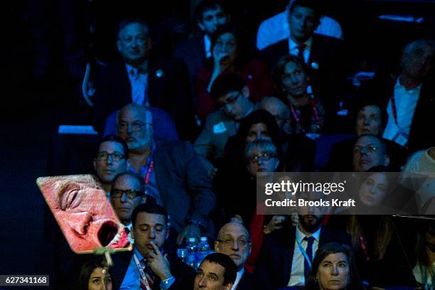 Reflected on the screen of a teleprompter, Republican presidential candidate Donald Trump addresses the annual policy conference of the American...