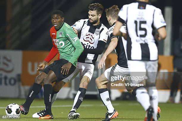 Taiwo Awoniyi of NEC Nijmegen, Robin Propper of Heracles Almeloduring the Dutch Eredivisie match between Heracles Almelo and NEC Nijmegen at Polman...