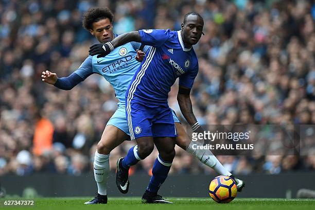Chelsea's Nigerian midfielder Victor Moses vies with Manchester City's German midfielder Leroy Sane during the English Premier League football match...
