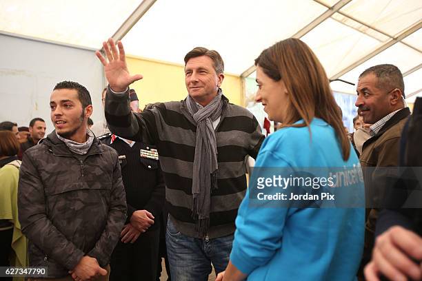 Slovenian President Borut Pahor meets staff at Makani's gym, run by Unicef, during his visit to the Zaatari refugee camp on December 3, 2016 near Al-...