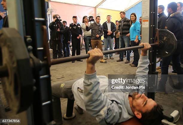Slovenian President Borut Pahor watches Syrian refugee children during their exercise at Makani's gym, run by Unicef, during his visit to the Zaatari...