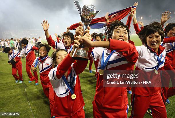 Korea DPR players celebrat with the trophy after winning the FIFA U-20 Women's World Cup, Final match between Korea DPRand France at the National...