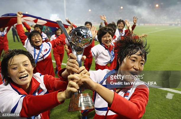 Korea DPR players celebrat with the trophy after winning the FIFA U-20 Women's World Cup, Final match between Korea DPRand France at the National...